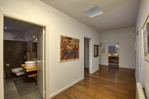 a room with a bathroom with a sink and a toilet at CAN COLL DES COCONS BAREFOOT HOUSE 5MIN FROM PACHA in Ibiza Town