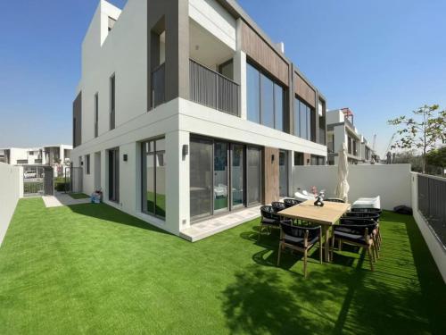 Luxury 4 Bedroom Villa with Maids Room in Aura 3 Tilal Al Ghaf - Allsopp & Allsopp