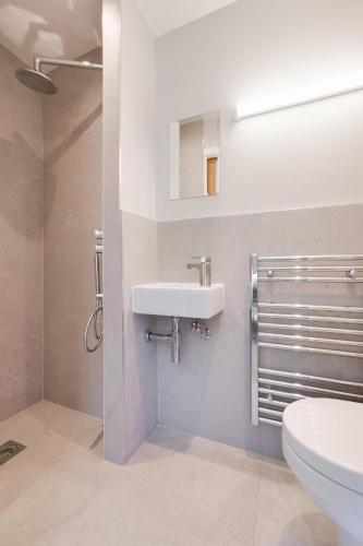 a bathroom with a sink and a toilet at 3 Bed in Helmsley oc-y111 in Helmsley