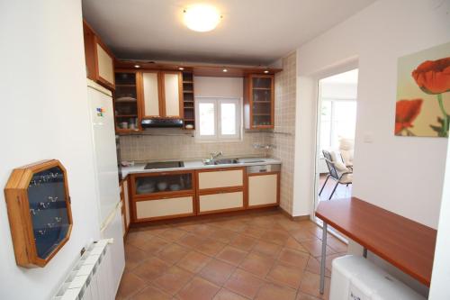 a kitchen with a sink and a counter top at Sea side Punat in Punat