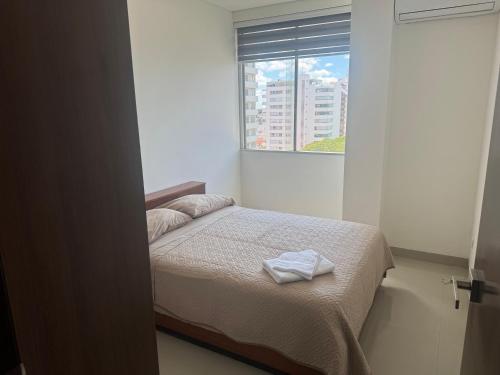 Kama o mga kama sa kuwarto sa Edificio Mirador las Américas