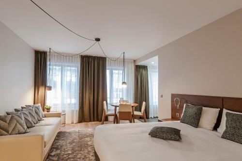 Postel nebo postele na pokoji v ubytování Aparthotel Residence Agenda