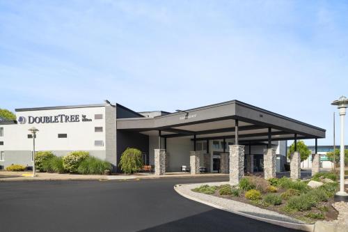 a rendering of a building with a garage at DoubleTree by Hilton Providence Airport Warwick in Warwick