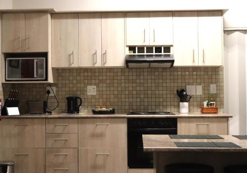 Ama's Self Catering 주방 또는 간이 주방