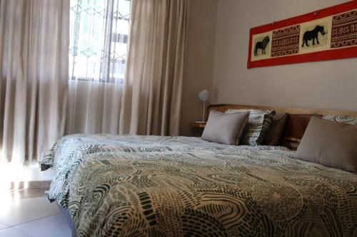 Ama's Self Catering 객실 침대
