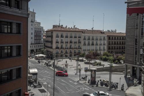 a view of a street in a city with buildings at Petit Palace Plaza España in Madrid