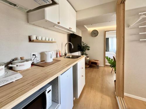 Super Lux new 2 bedroom Suite Mboa Center Tokyo Max 6