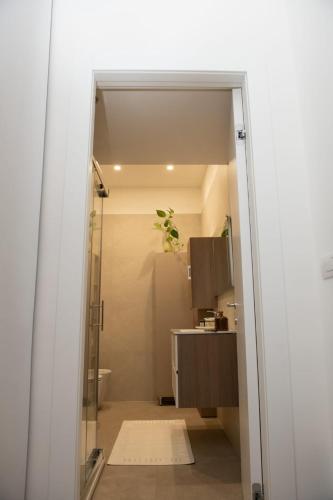 a bathroom with a shower and a sink at via Minzoni 26 in Cosenza