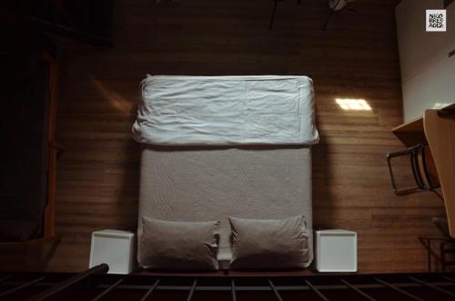מיטה או מיטות בחדר ב-Agriturismo Nicobresaola