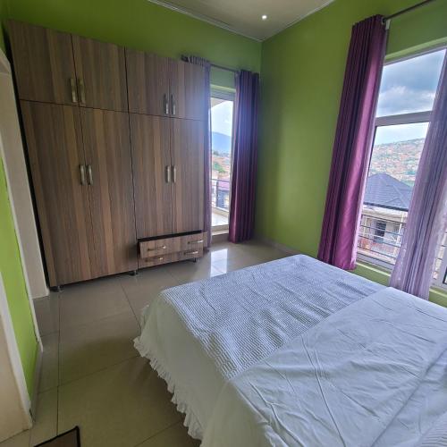 Postel nebo postele na pokoji v ubytování Angel Castel