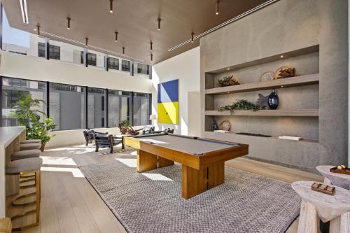 a room with a ping pong table in it at Upscale Downtown Condo Pool Gym & Skyline Views in Miami