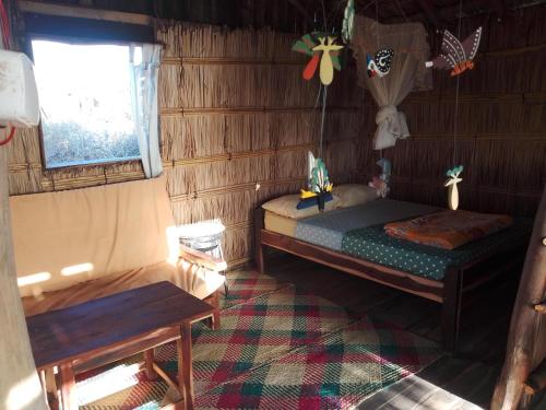Llit o llits en una habitació de Camp vezo