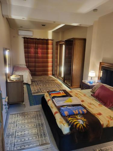 เตียงในห้องที่ Apartment Gilbert