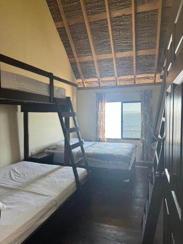 Postel nebo postele na pokoji v ubytování Rancho Morgan