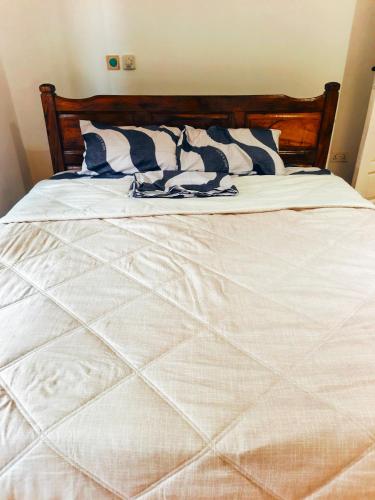 Llit o llits en una habitació de JADA Hotel