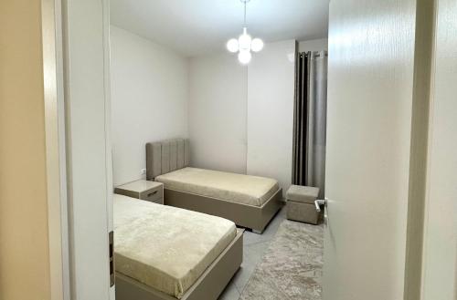 Fotografija v galeriji nastanitve Mason Apartment v mestu Kamëz