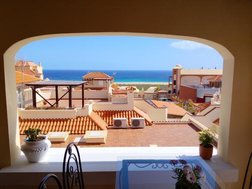 a view of a balcony with a view of the ocean at Casa Chalet El Bucanero Morro Jable in Morro del Jable