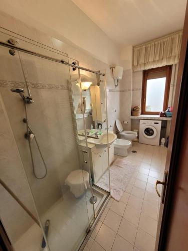 a bathroom with a shower and a sink and a toilet at la casa di Titty con wi fi in Avellino