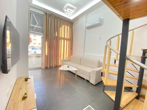 Llit o llits en una habitació de E&E Apartments