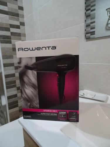 a box of a hair dryer sitting on a counter at Hotel Rural Sol 7 in Piedrahita de Castro