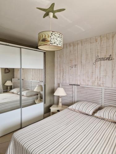 ARCACHON APPARTEMENT FACE PLAGE 5 pers Wi-Fi Parking Linge de maison gratuit 1chambre parentale 1cabine lits superposés 1 canapé lit
