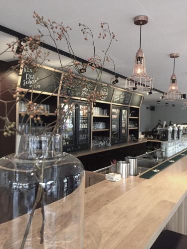 Ο χώρος του lounge ή του μπαρ στο Hotel Brasserie de Kaai