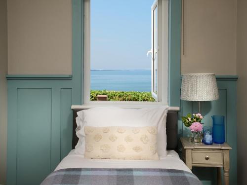 Postelja oz. postelje v sobi nastanitve Armada Cottages