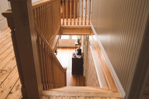 an overhead view of a staircase in a house at Auberge La Seigneurie in Matane