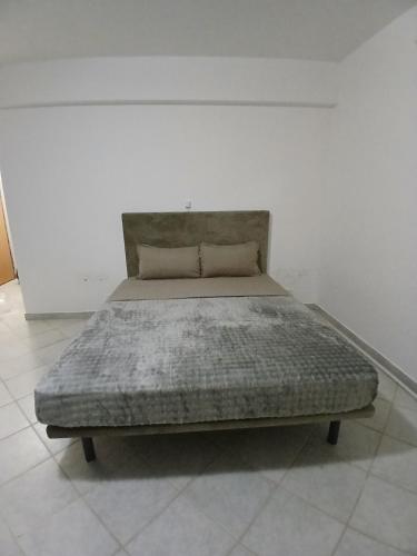 Llit o llits en una habitació de Miguel house 2