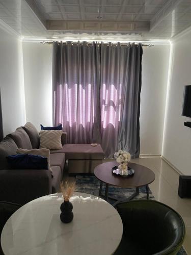 Zona d'estar a Mandy & Mos' Greenfields Cottage