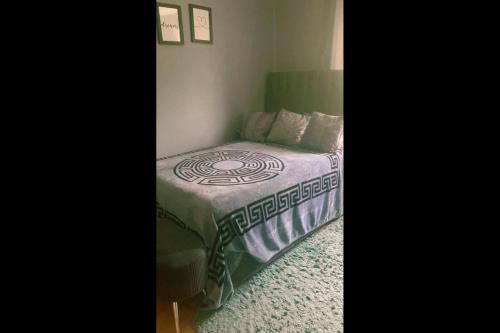 Llit o llits en una habitació de Asuna Villa