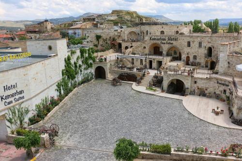 a view of a building with a courtyard at Kemerhan Cave Suites in Urgup