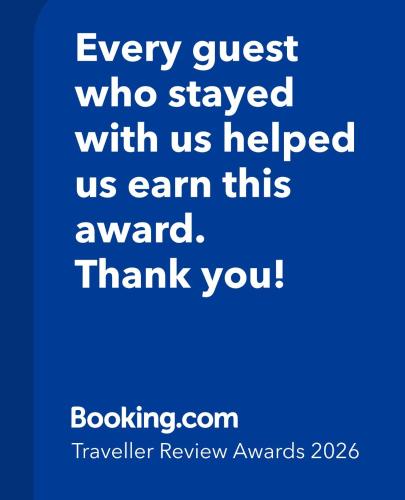 a blue poster with the words every guest who stayed with us helped us earn this at Church Street Shop Top in Bellingen