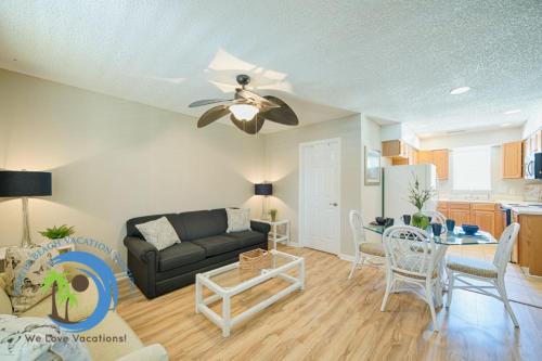 a living room with a couch and a table at Windy Hill Villa 2 - Beach Retreat in Myrtle Beach