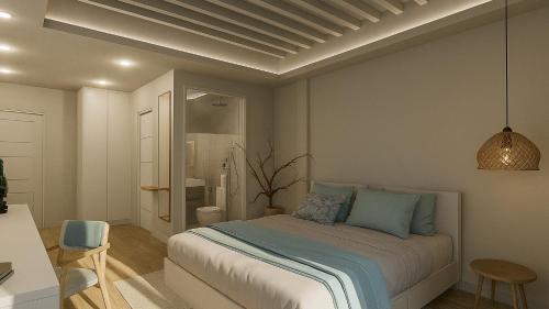 a bedroom with a bed and a bathroom at Dimora Blu Maldives in Dharavandhoo