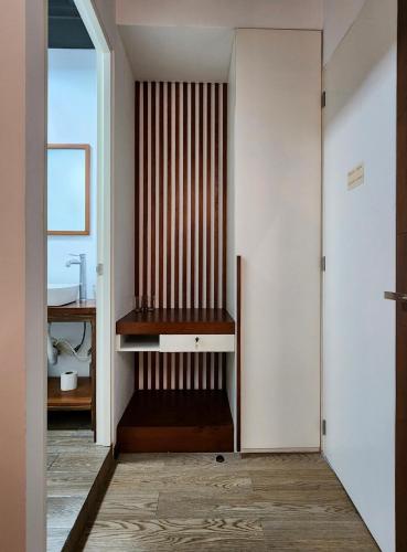 a room with a crib in the corner of a room at Torre Yaxche Urban Center in Cancún