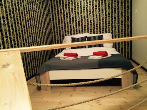 a room with a chair with ropes on it at Old Town Boutique Apartments in Liberec