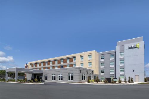 a rendering of the front of a building at Home2 Suites by Hilton Bangor in Bangor