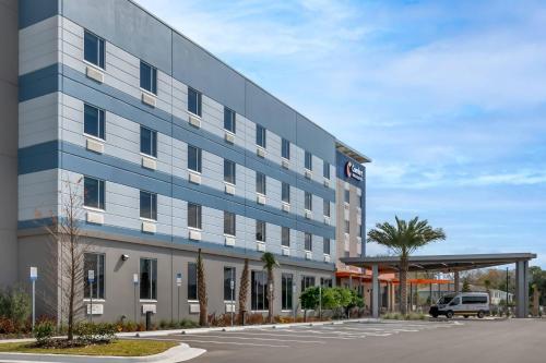 a rendering of the front of a hotel at Comfort Inn & Suites Orlando Sanford Airport in Sanford