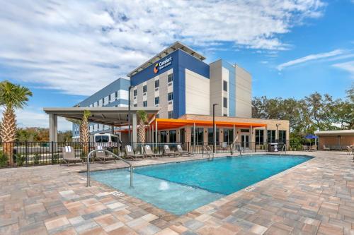 a rendering of a hotel with a swimming pool at Comfort Inn & Suites Orlando Sanford Airport in Sanford