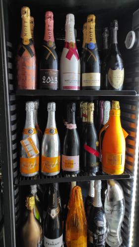 a refrigerator filled with lots of bottles of beer at ''B&B Santa Rita Corato fitta camere'' in Corato