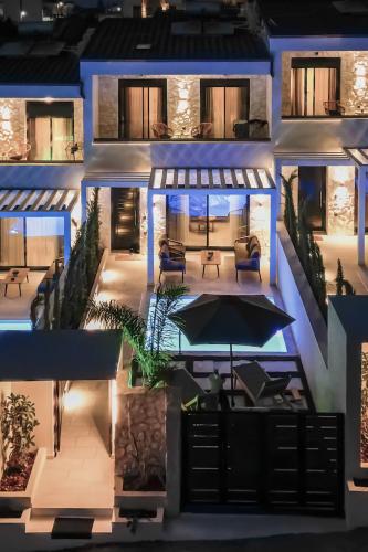 an aerial view of a house at night at Bela Villas in Kallithea Halkidikis