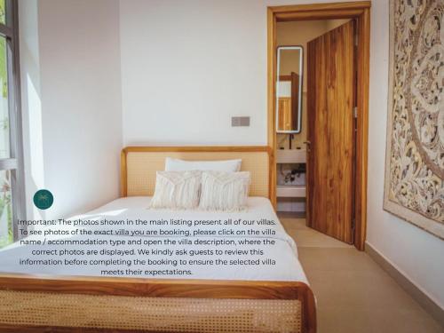 Llit o llits en una habitació de Paje Emerald Escapes