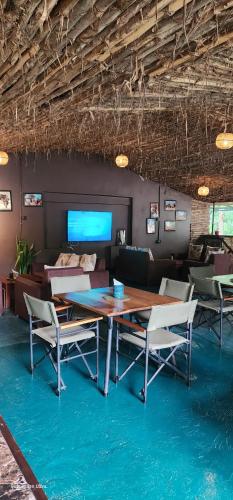 Televisor o centre d'entreteniment de Kizumba House