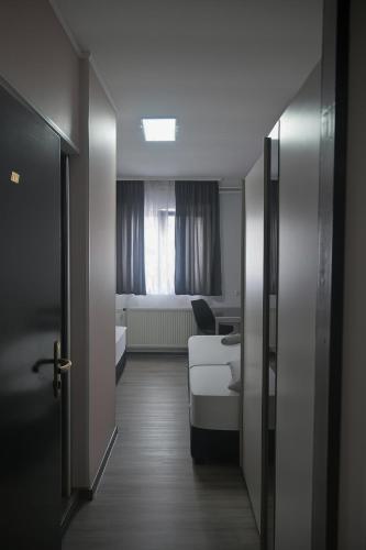 En eller flere senge i et værelse på Hostel M