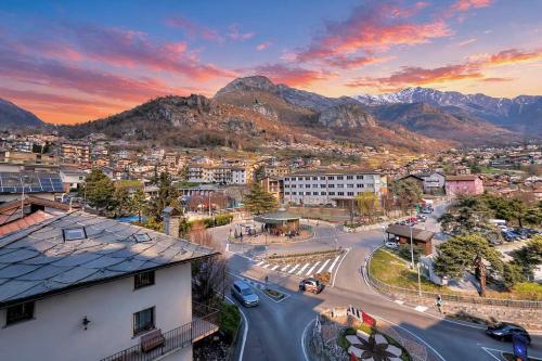 an aerial view of a city with mountains in the background at Apartment NicoCeli in Châtillon