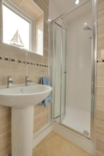 a bathroom with a sink and a shower at 2 Bed in Walcott oc-2209 in Walcott