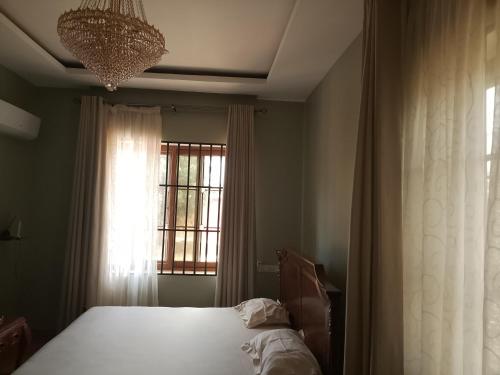 Llit o llits en una habitació de Same Harmony Hideaway