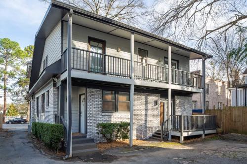 an apartment building with a balcony on a street at Boho Lux in Atlanta