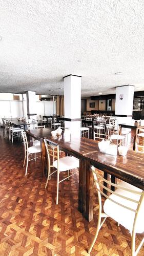 Ресторант или друго място за хранене в Hotel Tomebamba Cuenca